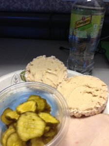 Lunch: Two plain rice cakes with hummus, three slices of turkey and a bounty of sweet and sour pickles plus lemon-lime seltzer.